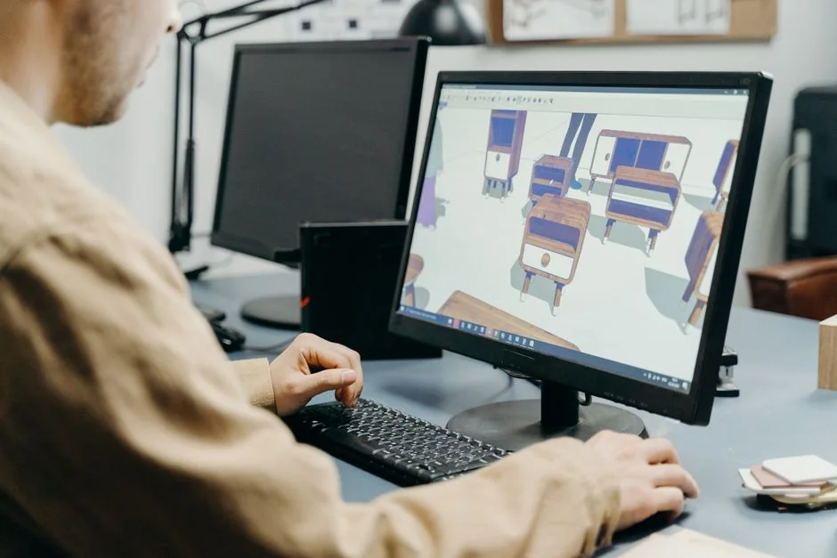 A person shopping online with a laptop and credit card, emphasizing the convenience of e-commerce.